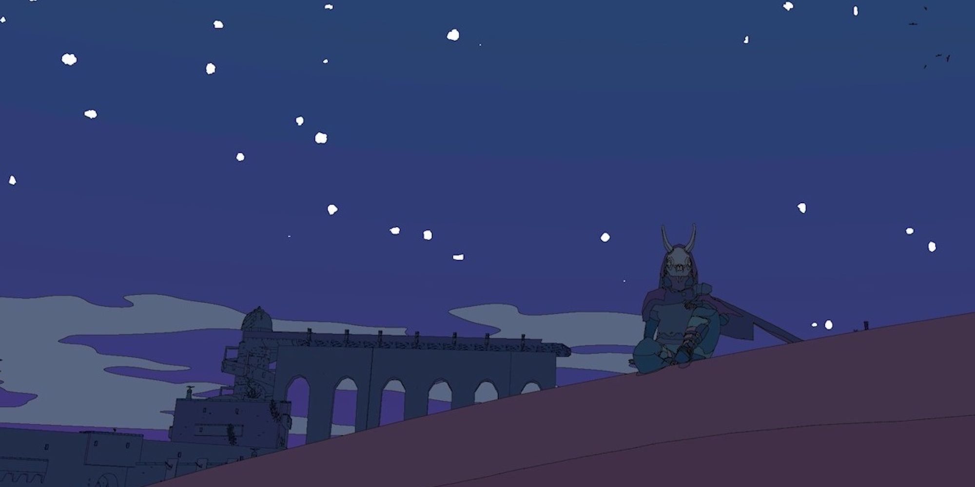 Sable sitting on a sand dune at night with a bridge in the background