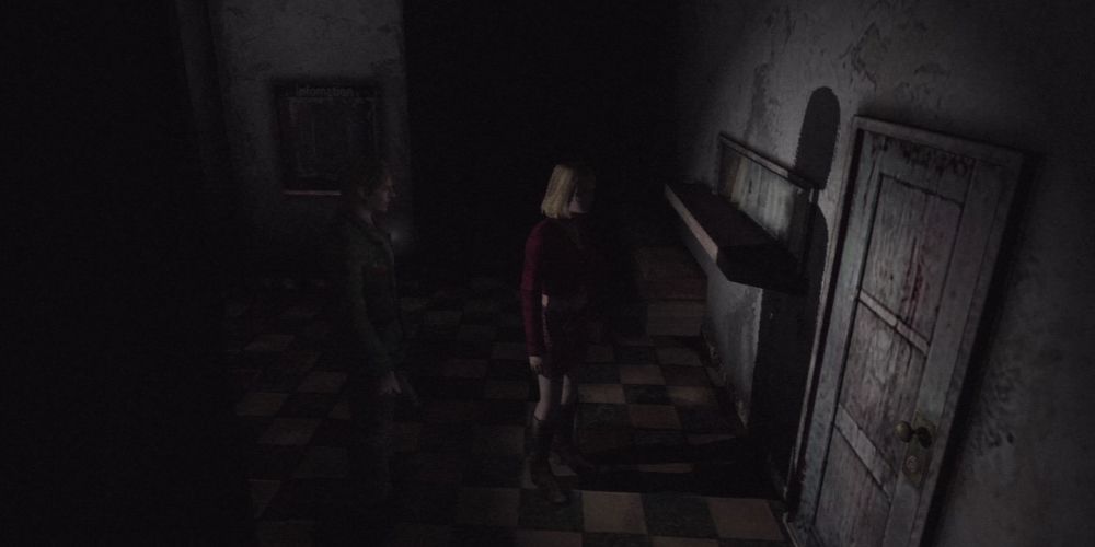 Silent Hill 2: James and Maria are exploring the (very dark) Brookhaven Hospital