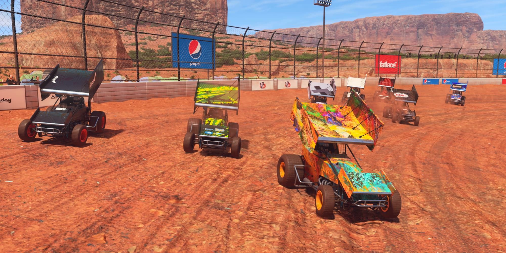 Racing with sprint cars on a dirt track