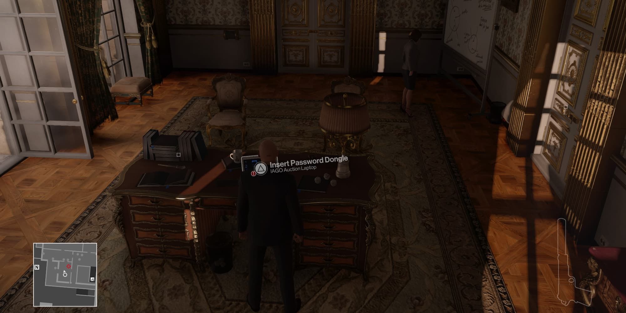 47 standing near a laptop with a prompt to sabotage the IAGO auction
