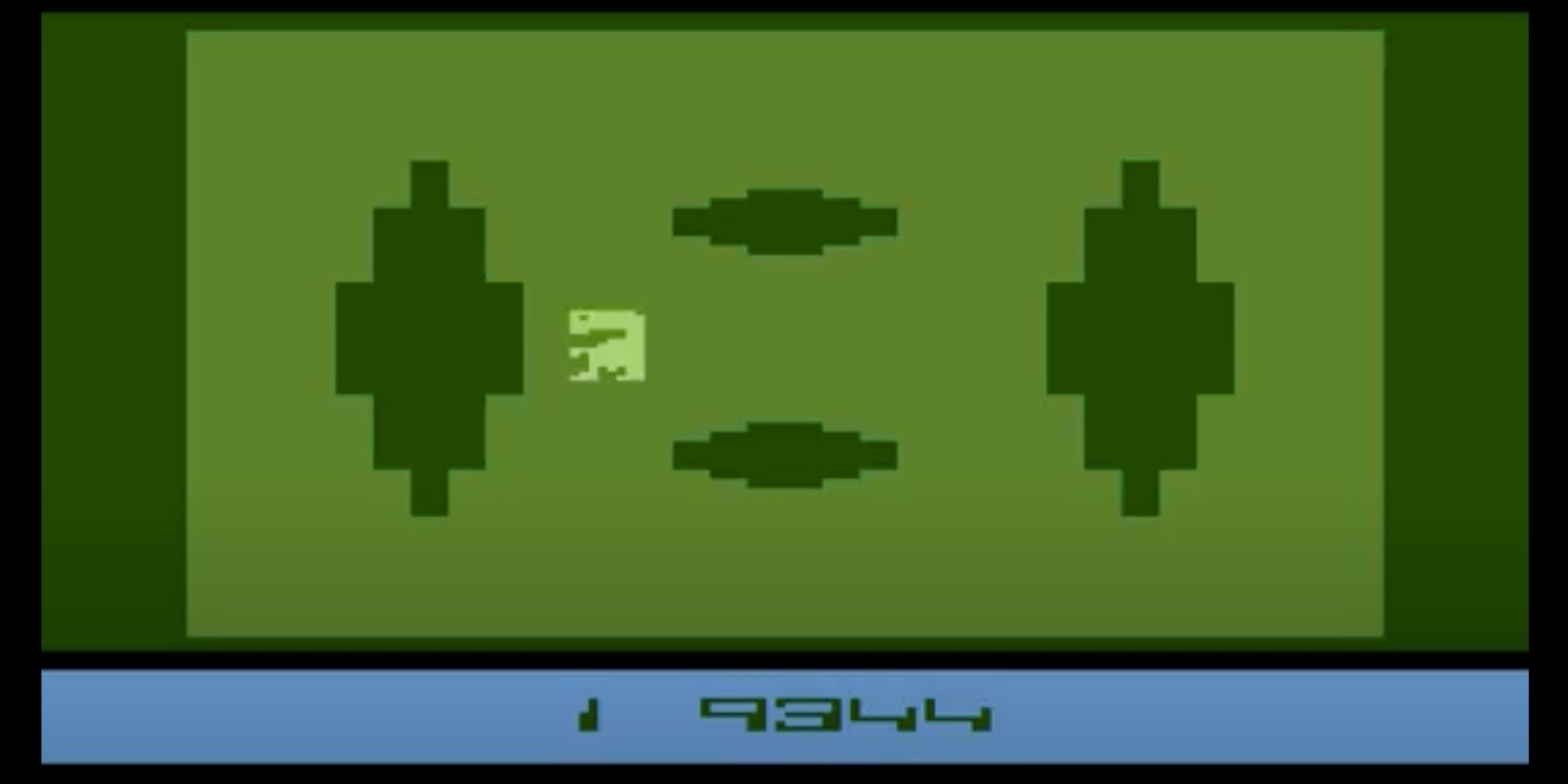 et-standing-in-front-of-a-tree-in-the-et-atari-game-2