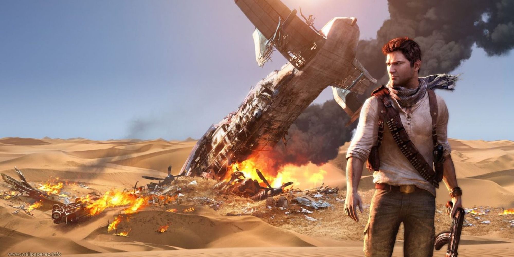 Nathaniel Drake stands holding a gun, while a crashed plane smokes and is on fire behind him