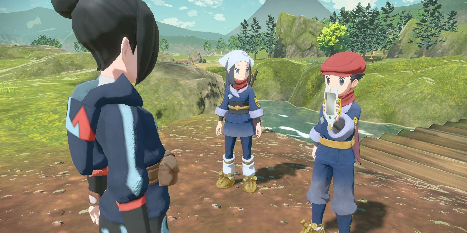 The player showing the Arc Phone to another character
