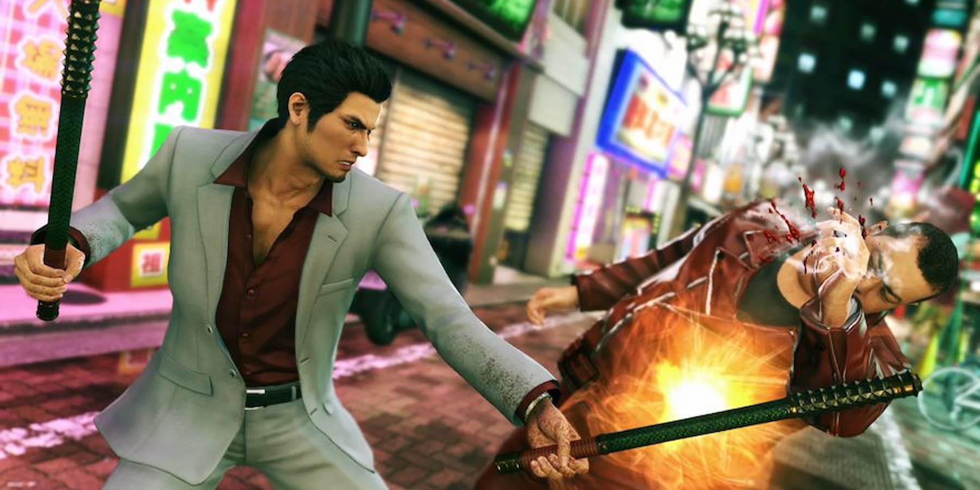 kiryu hitting a thug with some kali sticks