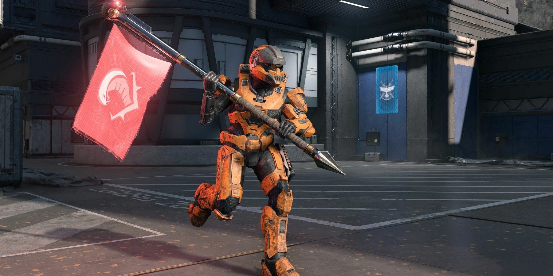 A spartan running with the enemy flag in Halo Infinite