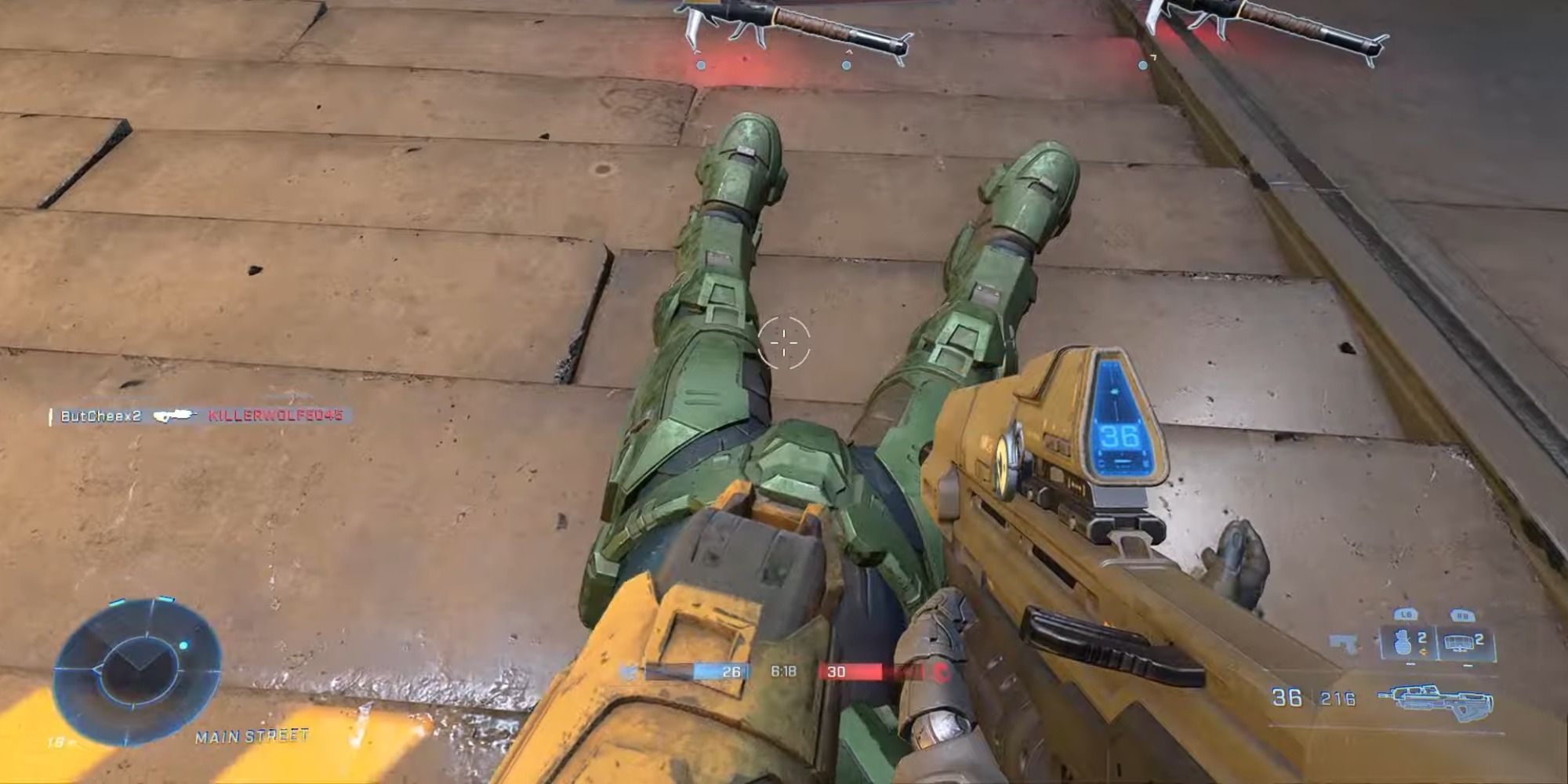 A screenshot showing a player performing a teabag in Halo Infinite