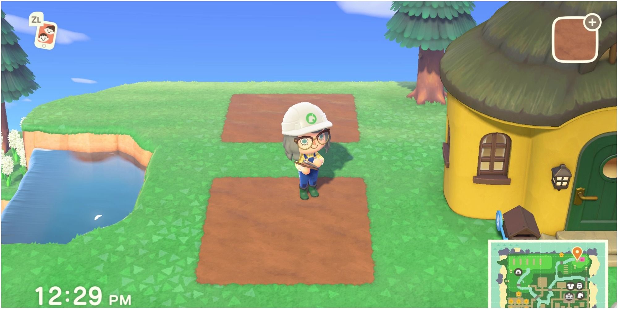 A player stands on a three by three square of dark dirt path