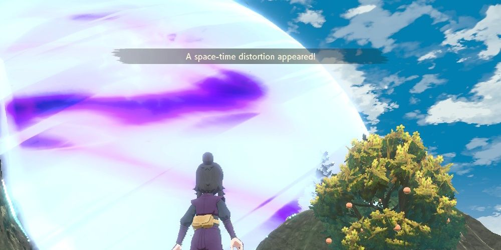 The female playable character in Pokemon Legends: Arceus standing in front of a Space-Time Distortion, with the text ‘A space-time distortion appeared!’ at the top of the screenshot. 