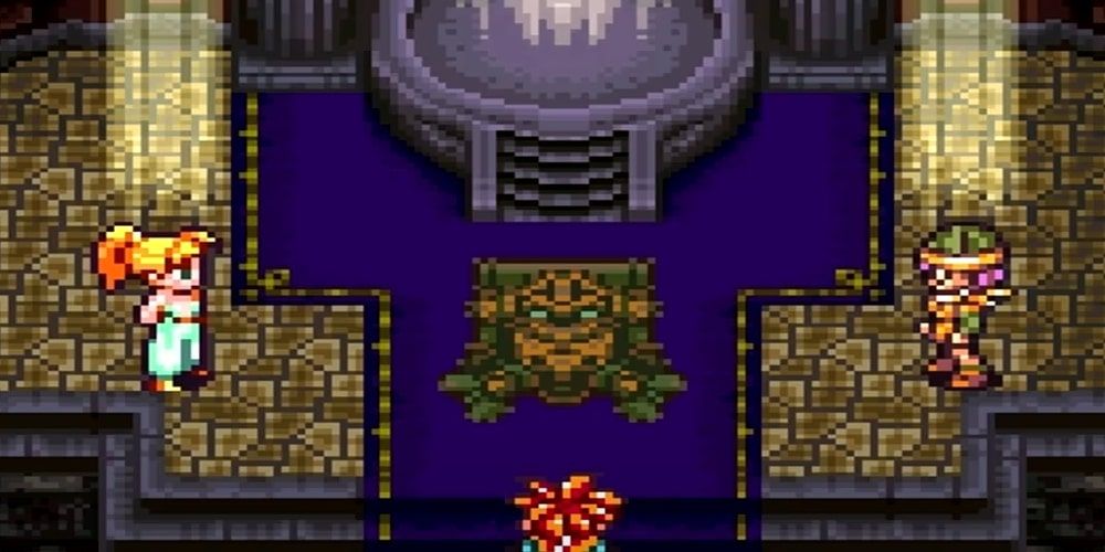 A screenshot of Marle, Crono and Lucca standing before a damaged Robo from restoring the forest in Chrono Trigger.