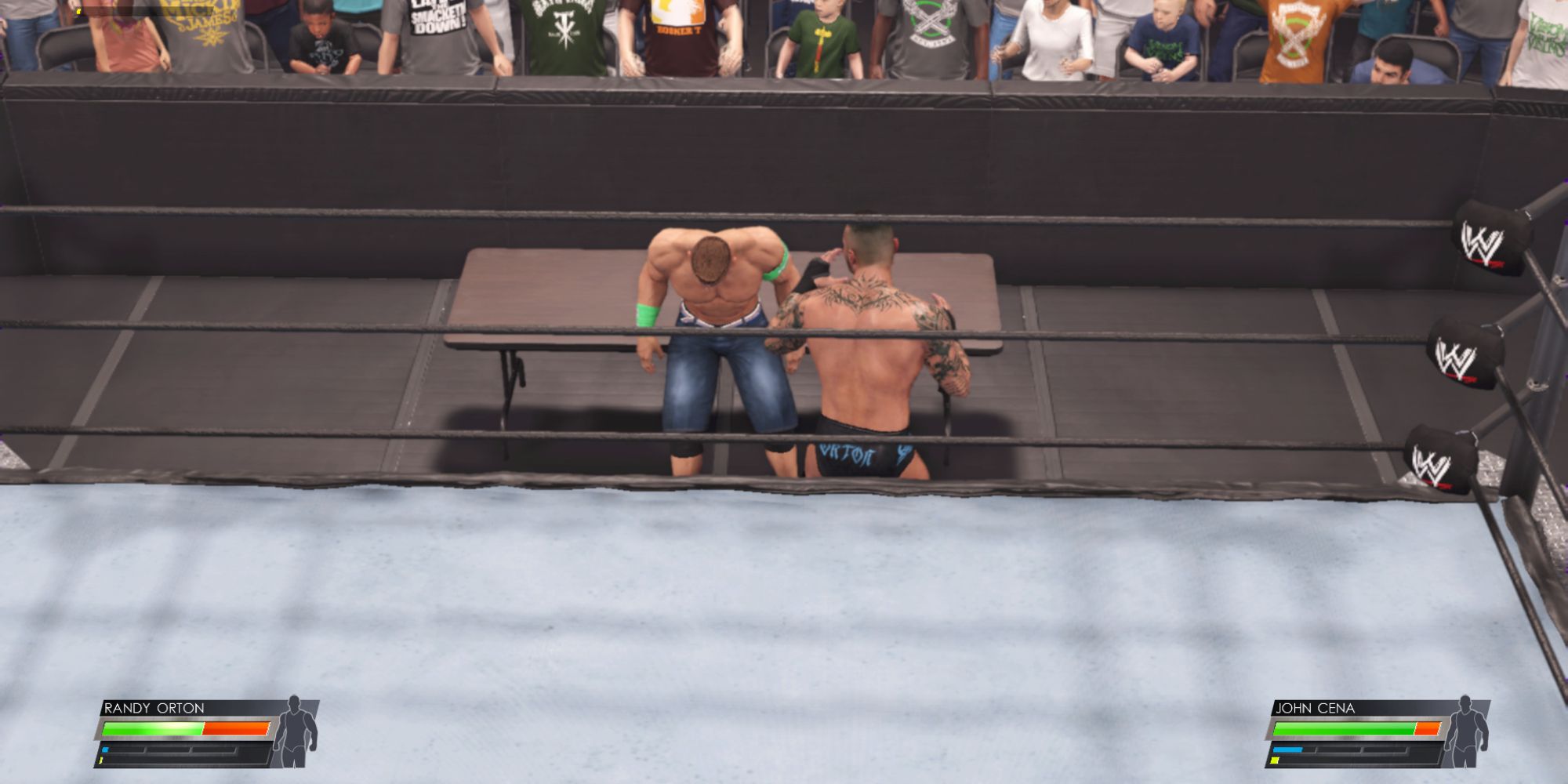 WWE 2K22 Screenshot Of Randy Orton Put Cena On Table