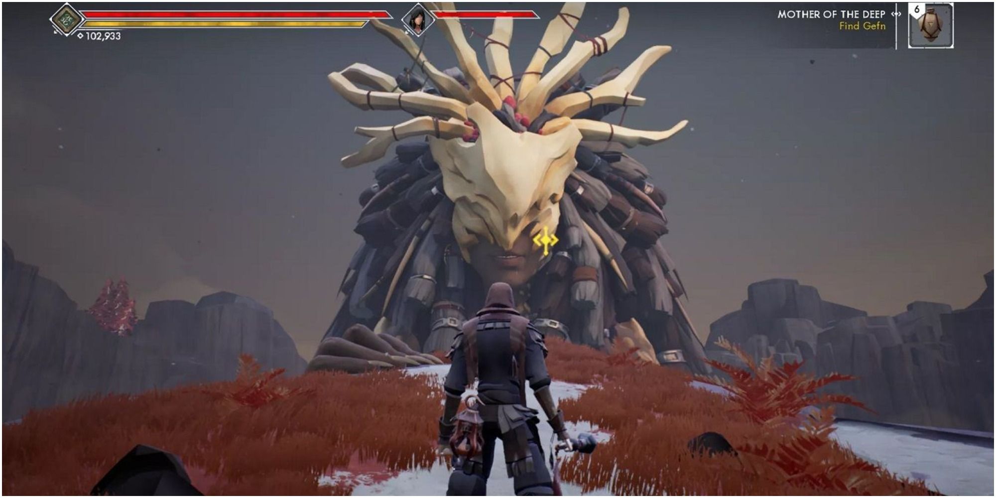 Protagonist facing a huge head with a mask.