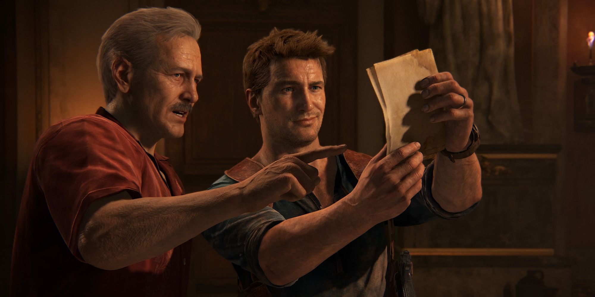 Nate & Sully looking at a document, Sully is pointing at it, Drake is holding it