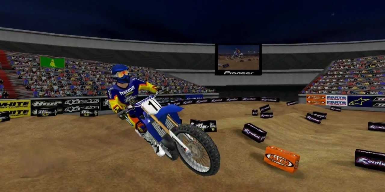 A player jumps a ramp in Motocross Madness 2