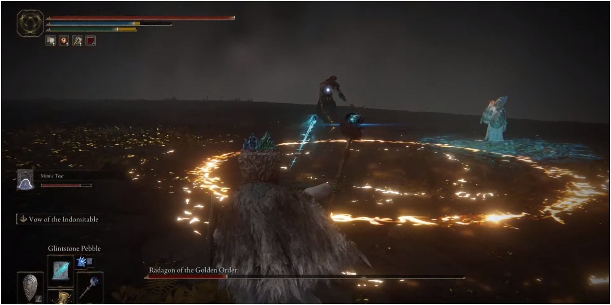 The player using Glintstone Pebble to deal damage to the boss.