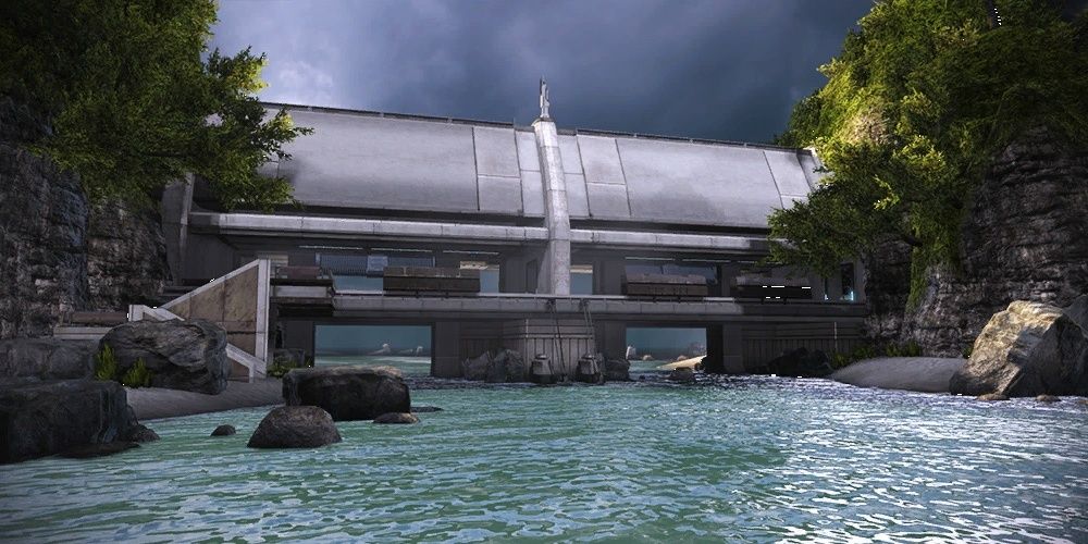 Mass Effect Virmire A body of water flows underneath a metal bridge.