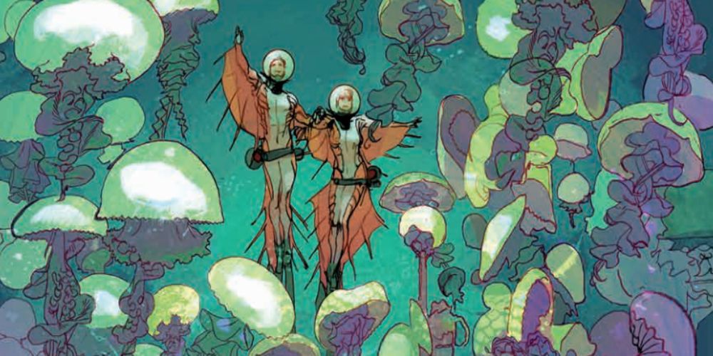 a frame from an issue of Low featuring two figures in futuristic diving suits floating underwater surrounded by jellyfish