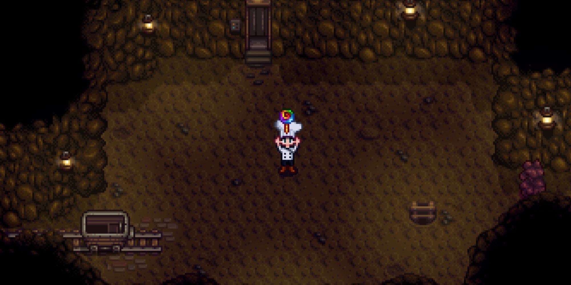 The farmer in Stardew Valley standing in the mines, wearing a chef's coat and chef's hat, and holding a miner's treat above their head. 