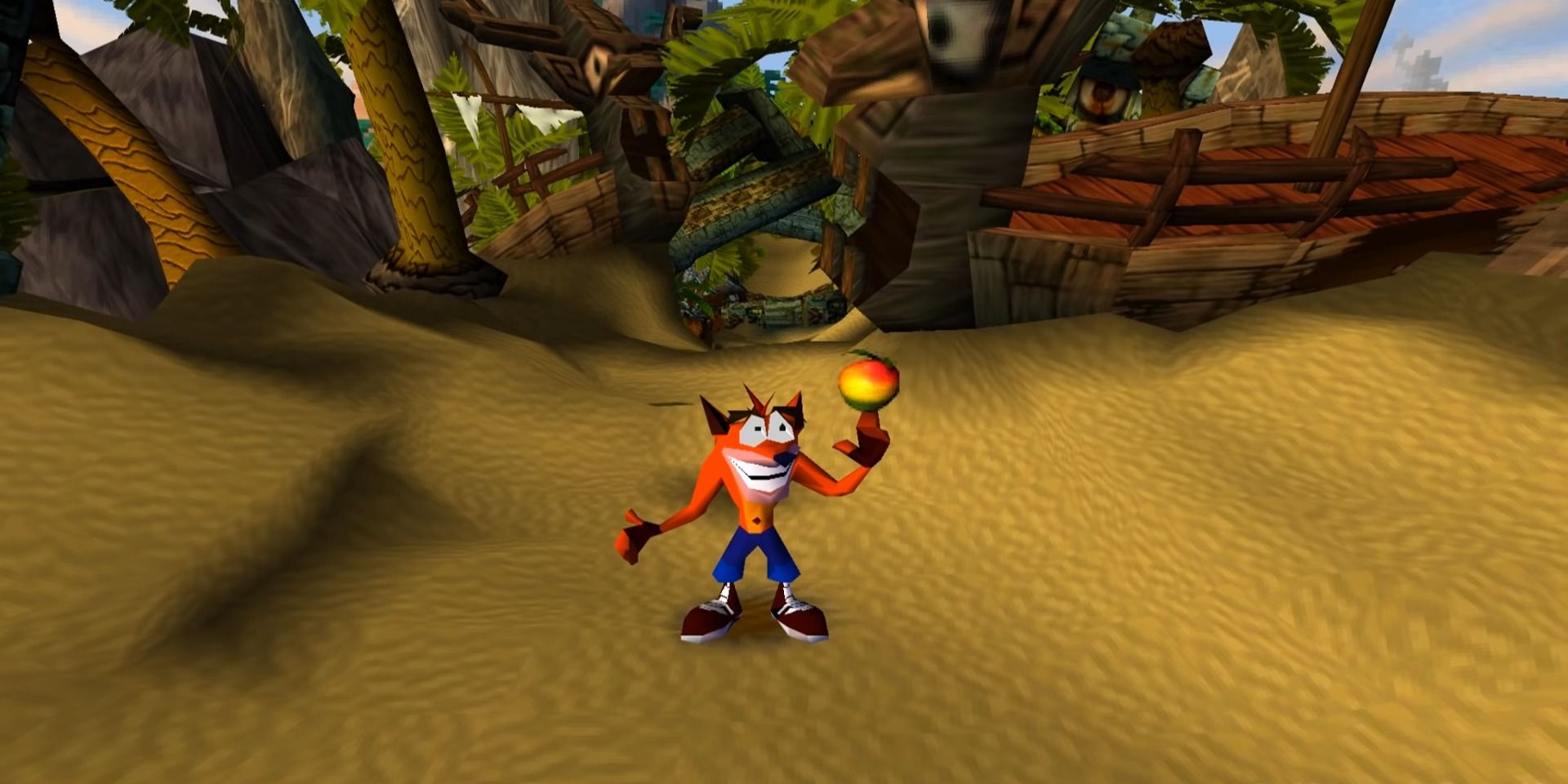 A screenshot showing Crash spinning a wumpa fruit on his finger in Crash Bandicoot