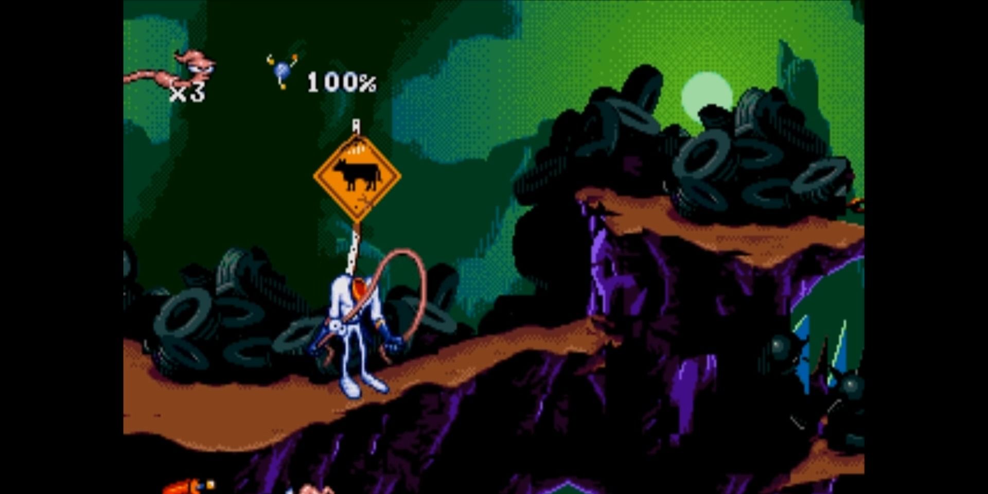 A screenshot showing Earthworm Jim playing jump rope with his body in Earthworm Jim