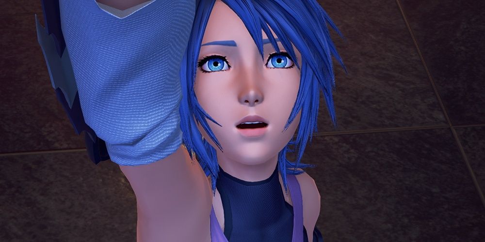Aqua reaching up in Kingdom Hearts: Birth By Sleep.