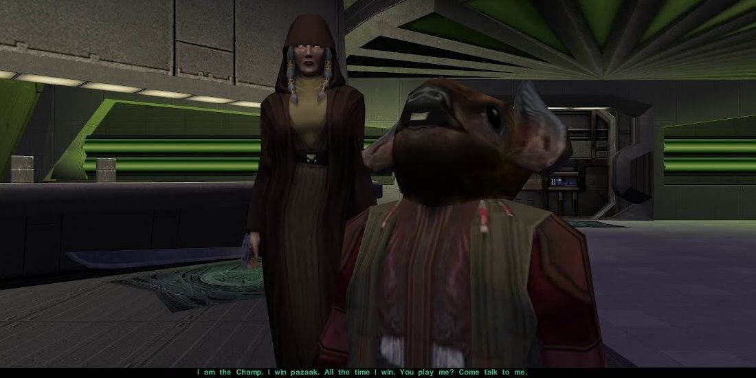 KOTOR 2 Pazaak Champ speaks to the player with Kreia watching.