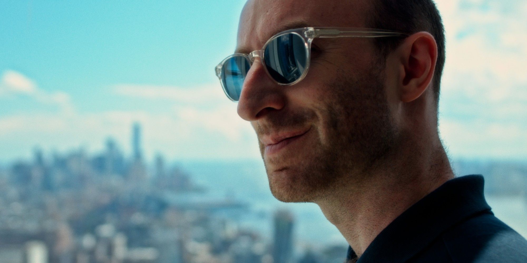 Patrick Willems smirking against a city backdrop in Night of the Coconut.