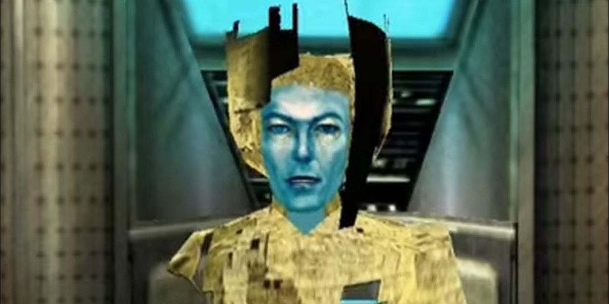 David Bowie with a blue face in front of a computer