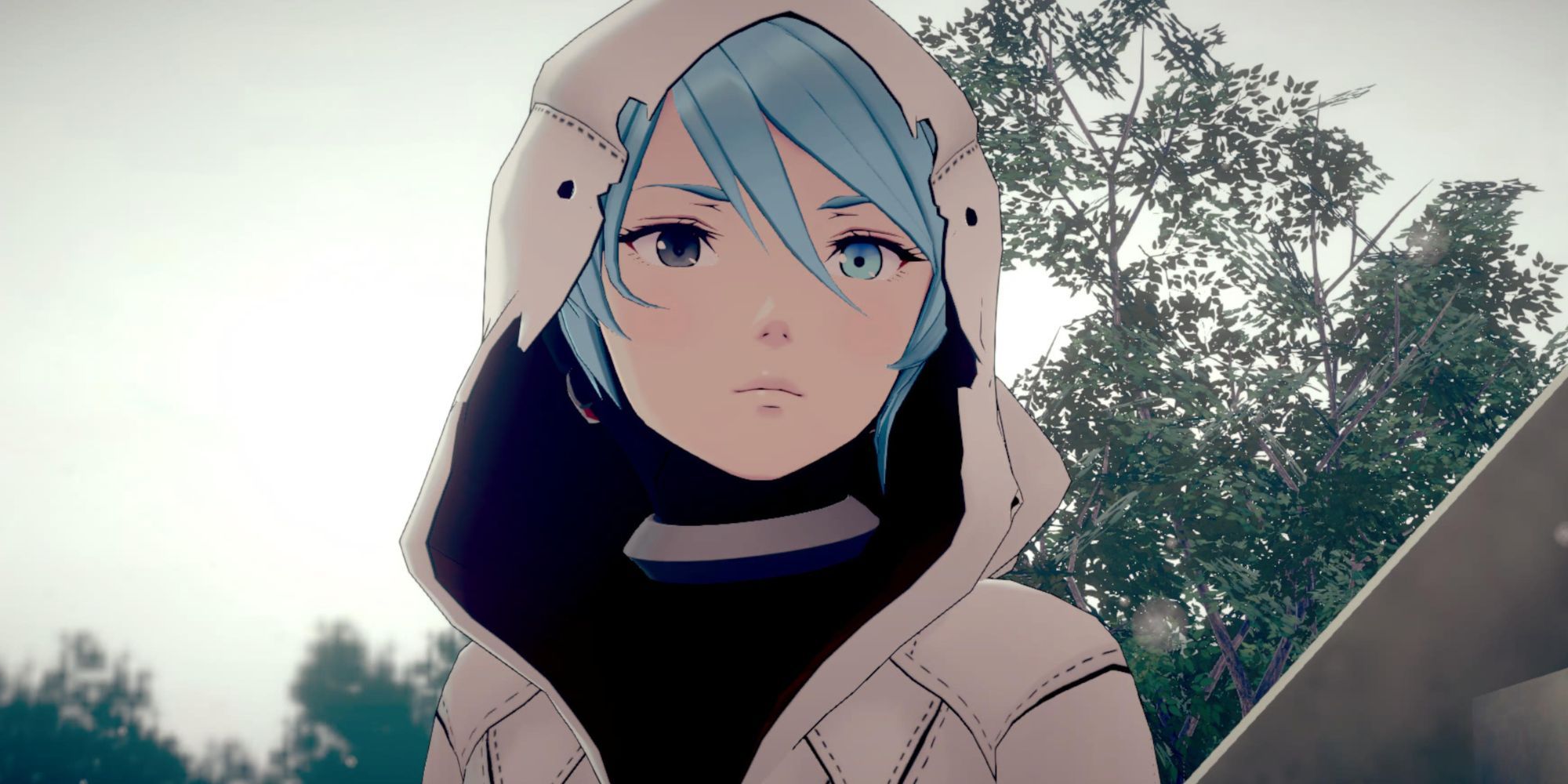 Bibi stands outside of the school on a sunny day
