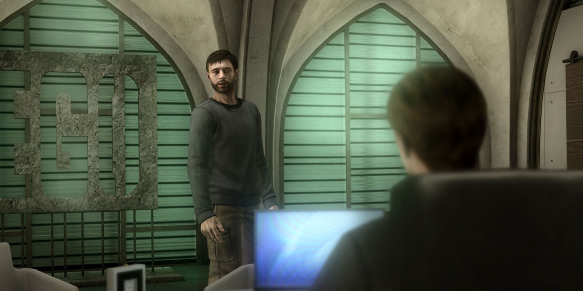 Ethan Mars Approaching Someone At A computer In Heavy Rain