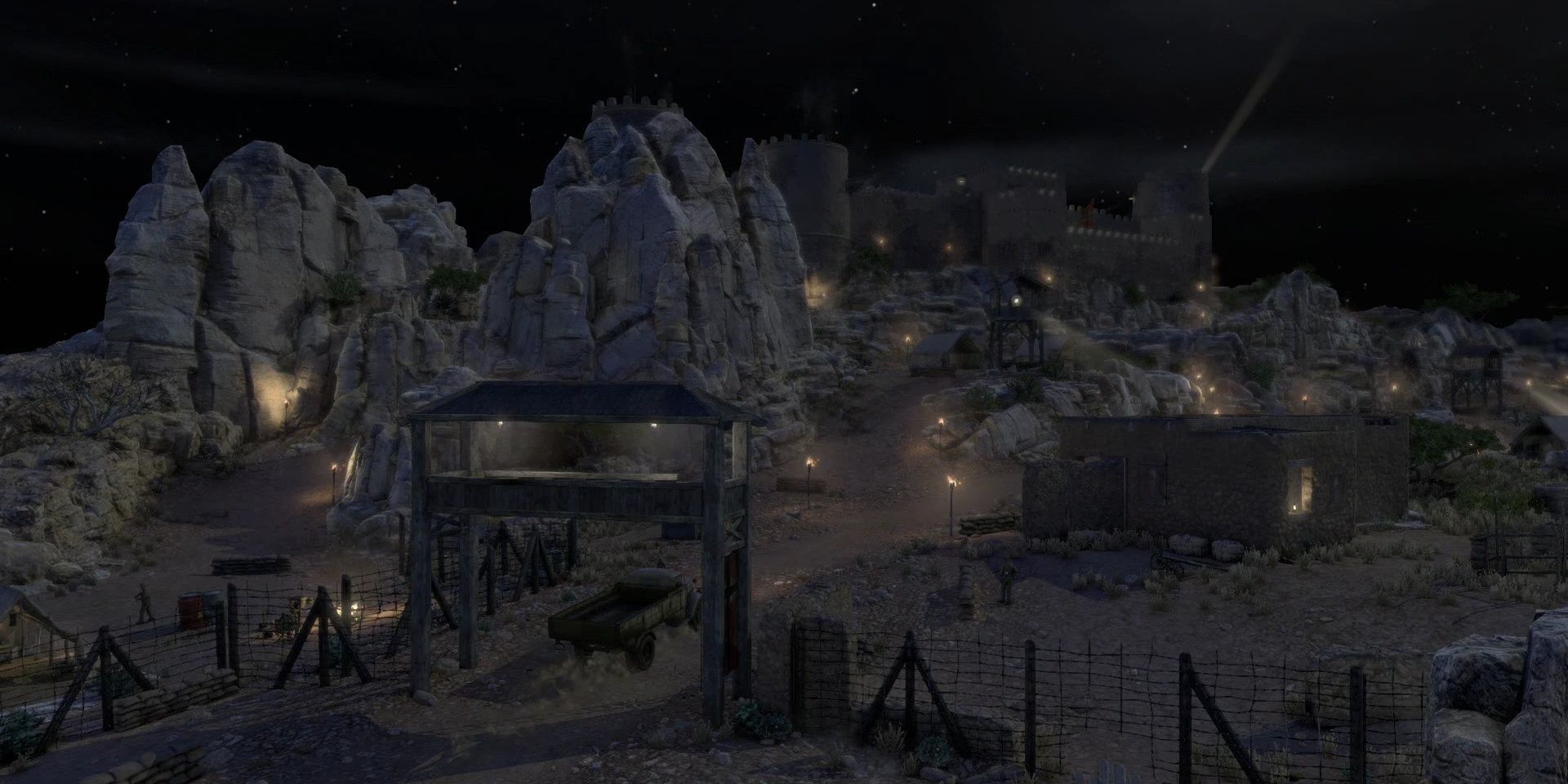 Sniper Elite 3 Fort Rifugio showing an overview of the fort and approach to it