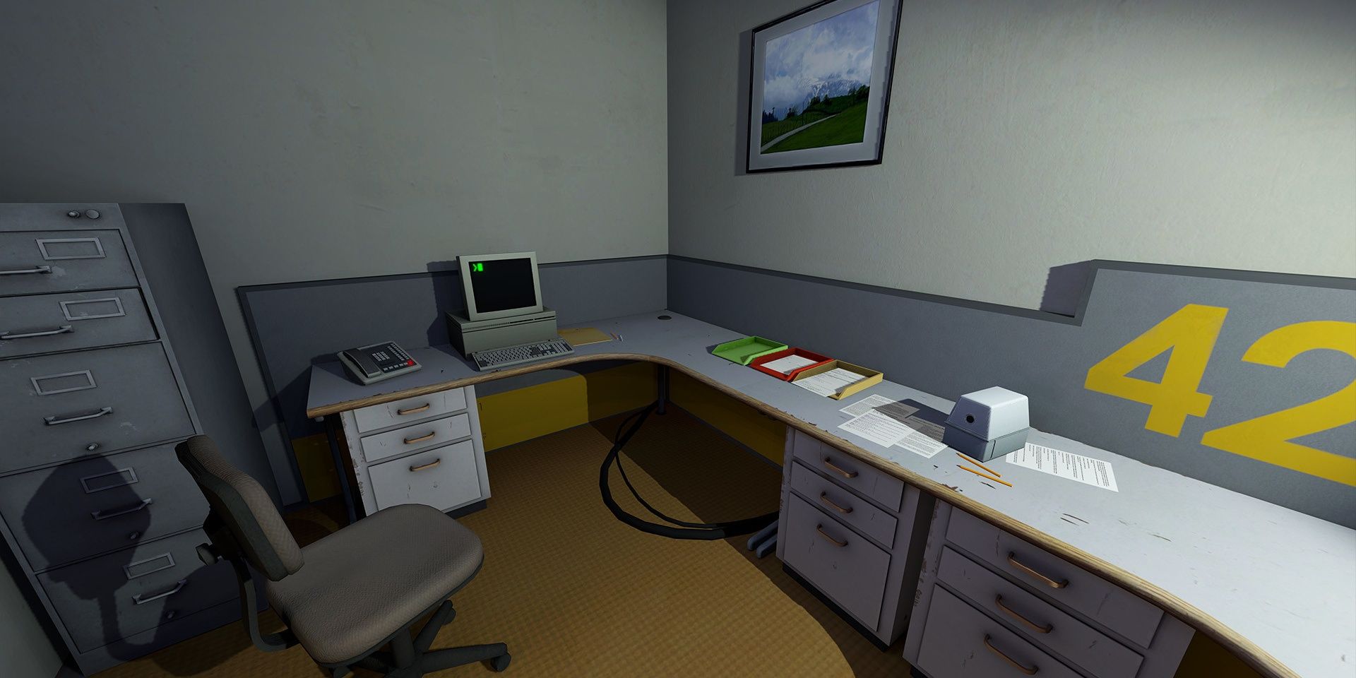 An empty office with the numbers "42" printed on the desk in The Stanley Parable