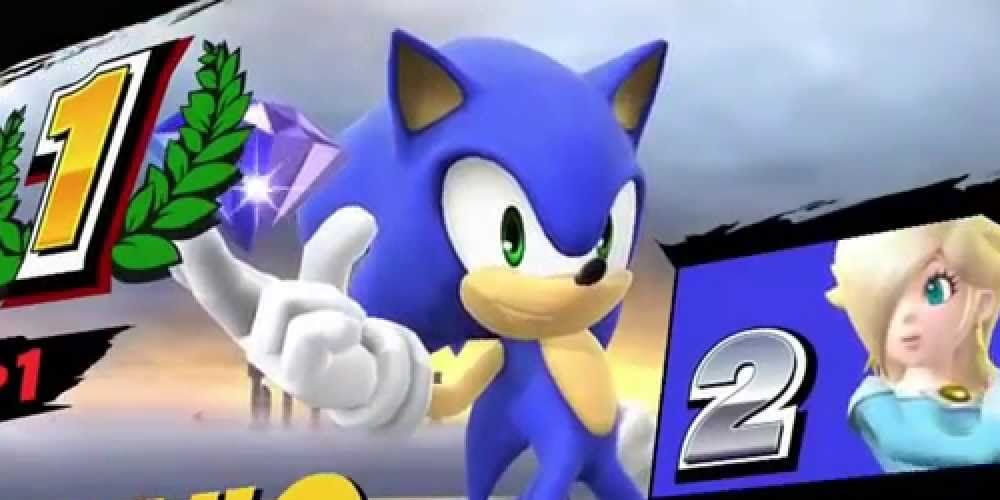 Sonic poses with a chaos emerald