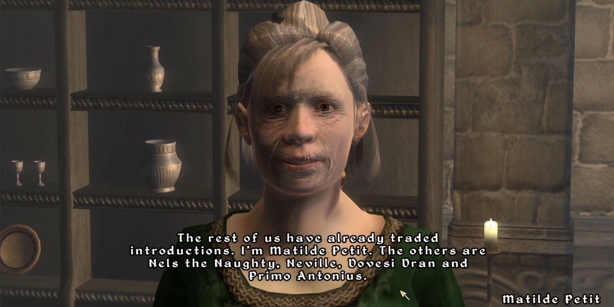 Matilde Petit speaks to the Hero of Kvatch introducing herself and other party attendees