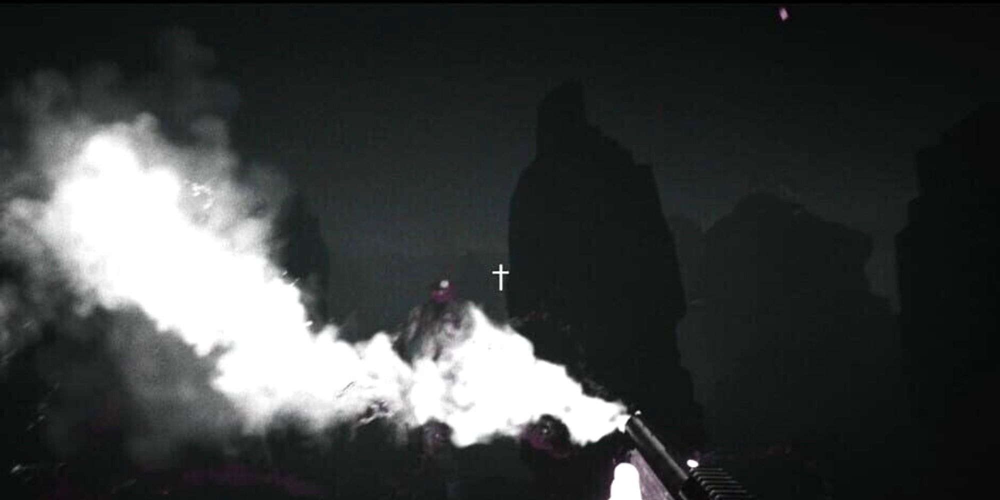 smoke comes out of the shotgun after aughust shoots at demons