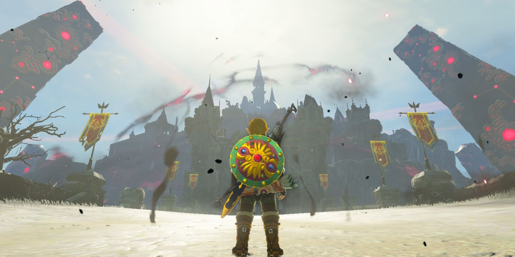 Link standing in front of Hyrule Castle as it is surrounded by swirling Malice.