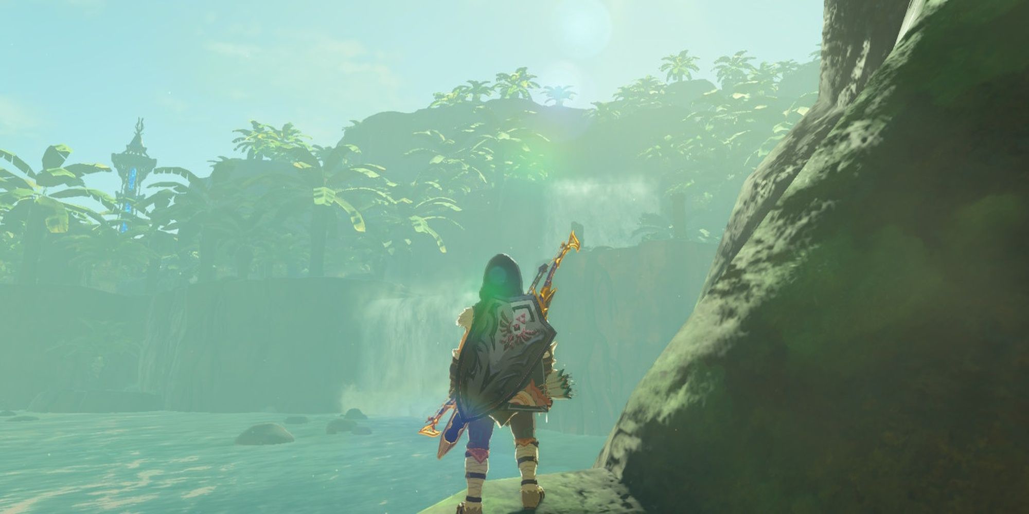 Link on a large tree root under Floria Bridge surrounded by water