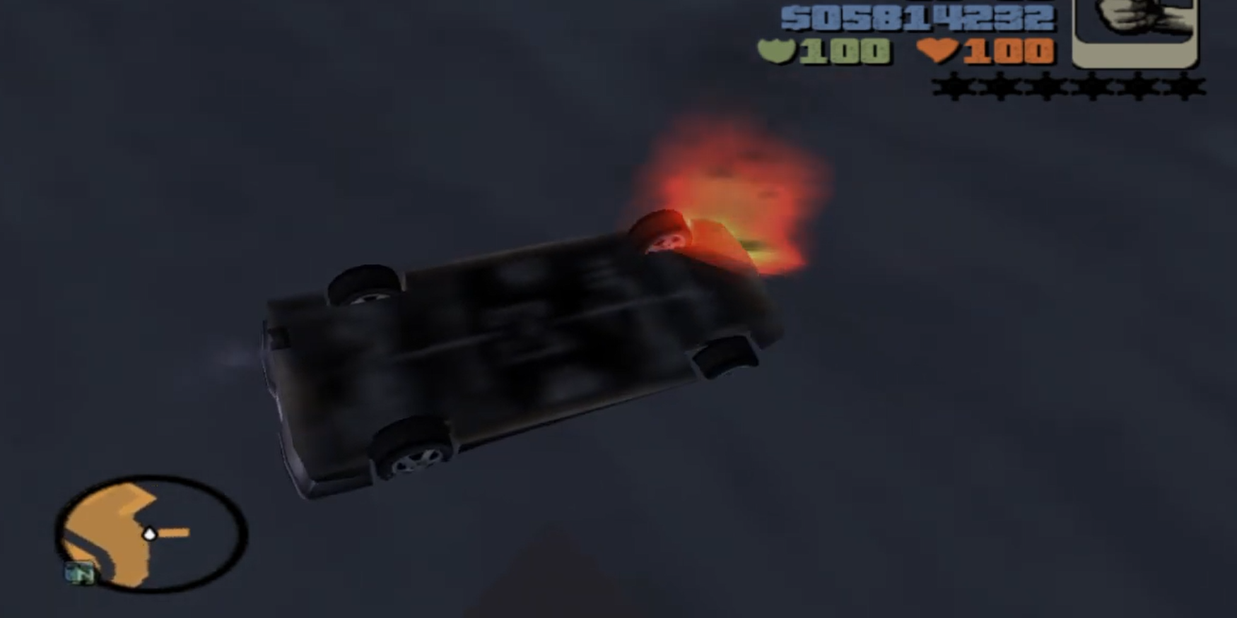 A car on fire in the sea