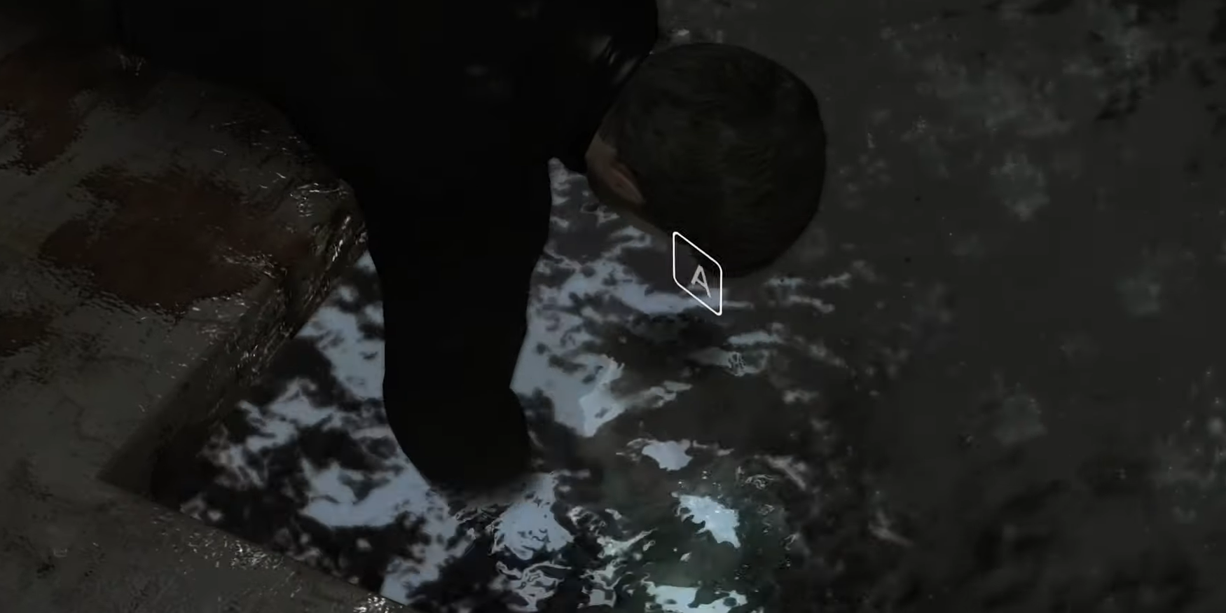 Ethan sticking his hand into a flooded cell