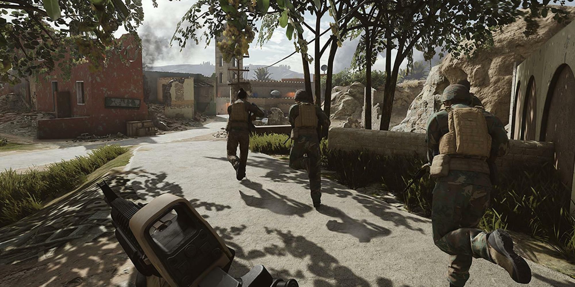 squad running through town in Insurgency Sandstorm
