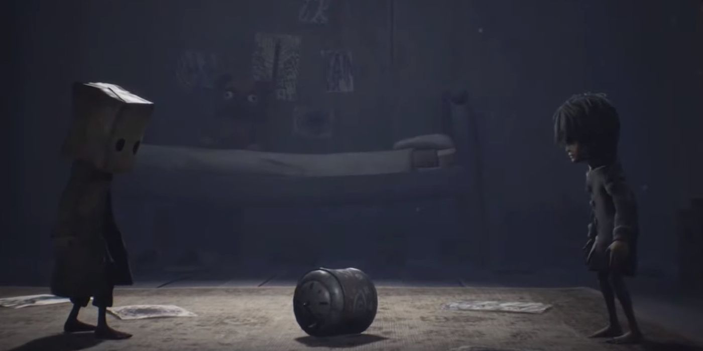 Mono and six stare at each other across an object in a gloomy bedroom