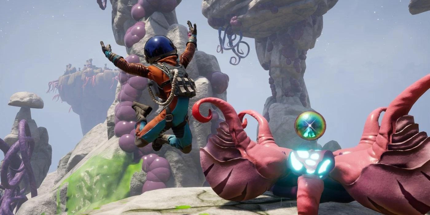 The player in Savage Planet leaping towards an alien