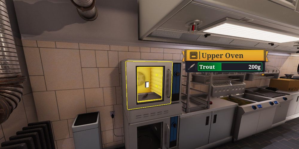view of kitchen, an industrial cooking oven is lit up, with details about a trout cooking appear on screen.