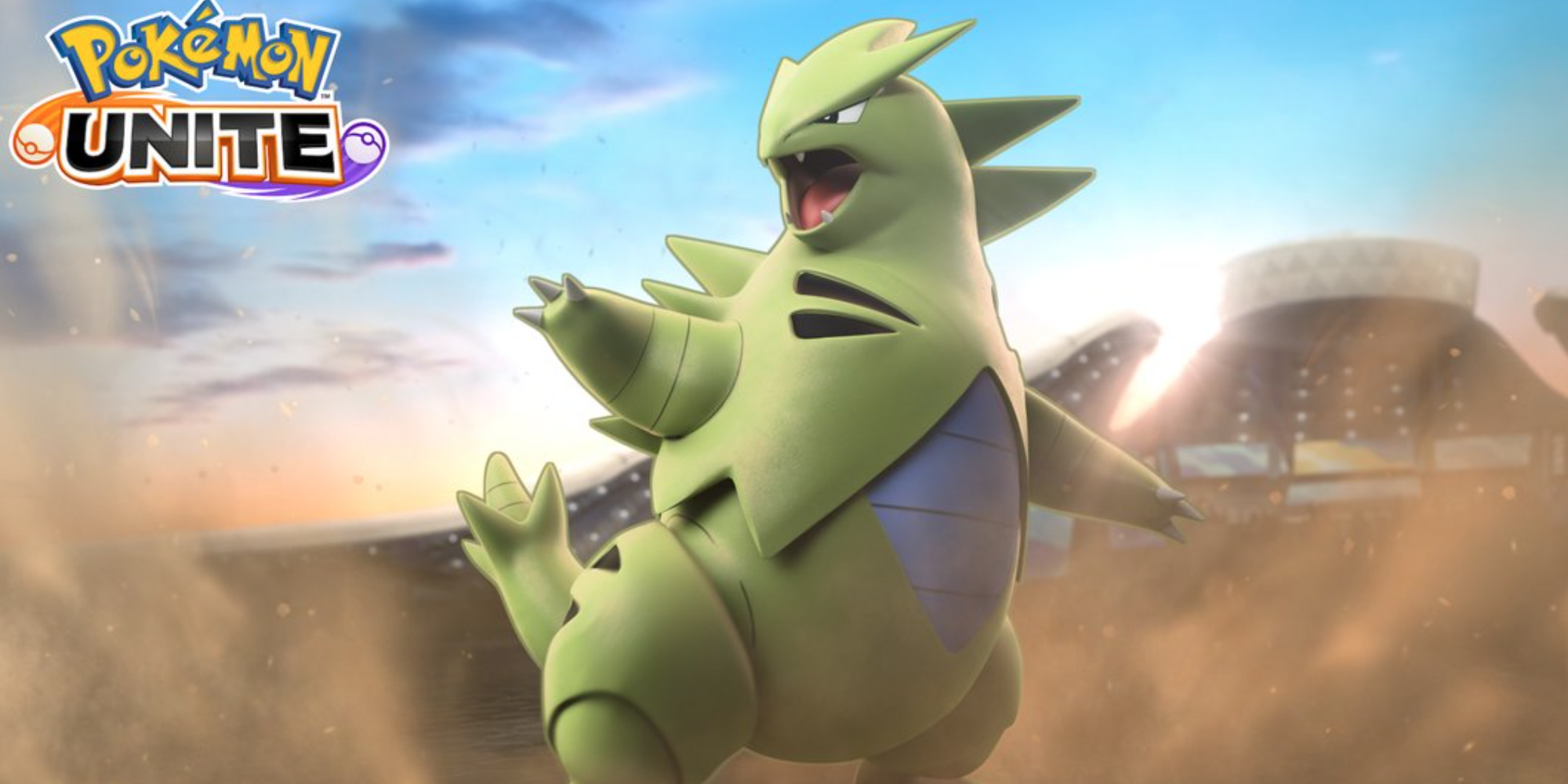 Pokemon Unite Jungler Tyranitar whips up a Sandstorm.