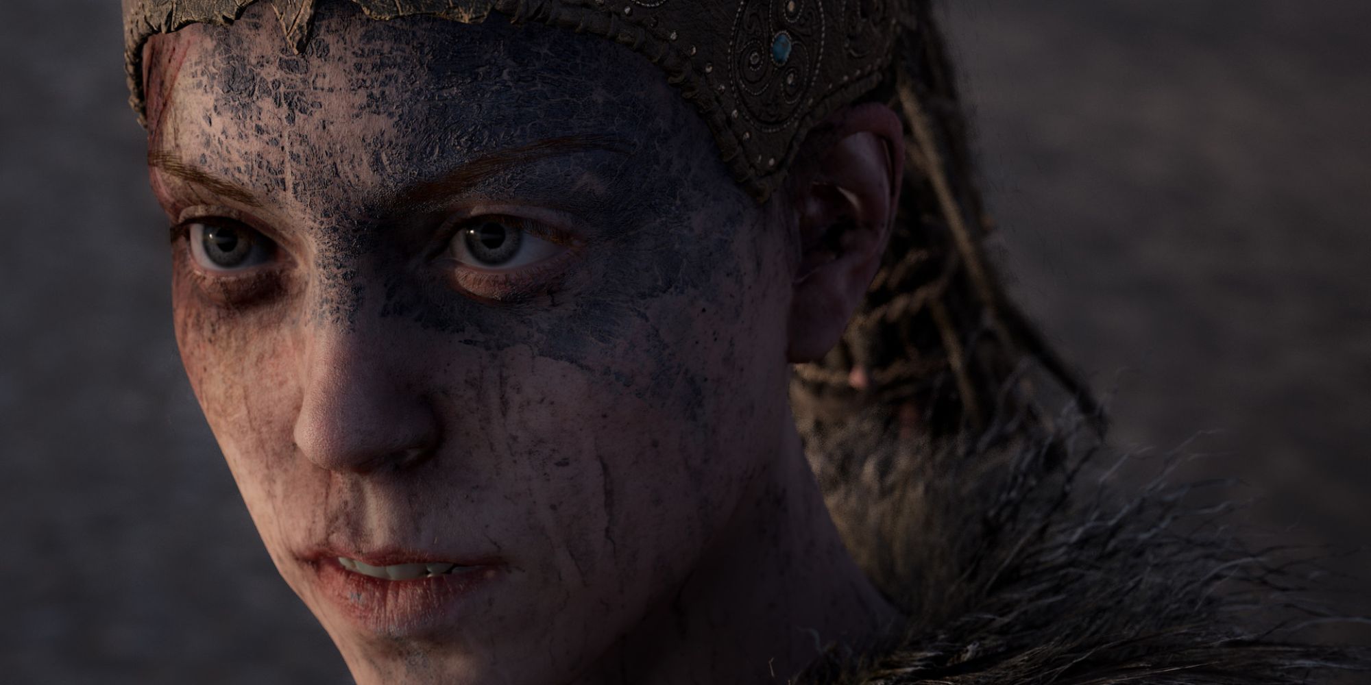 a close-up of Senua looking onward 
