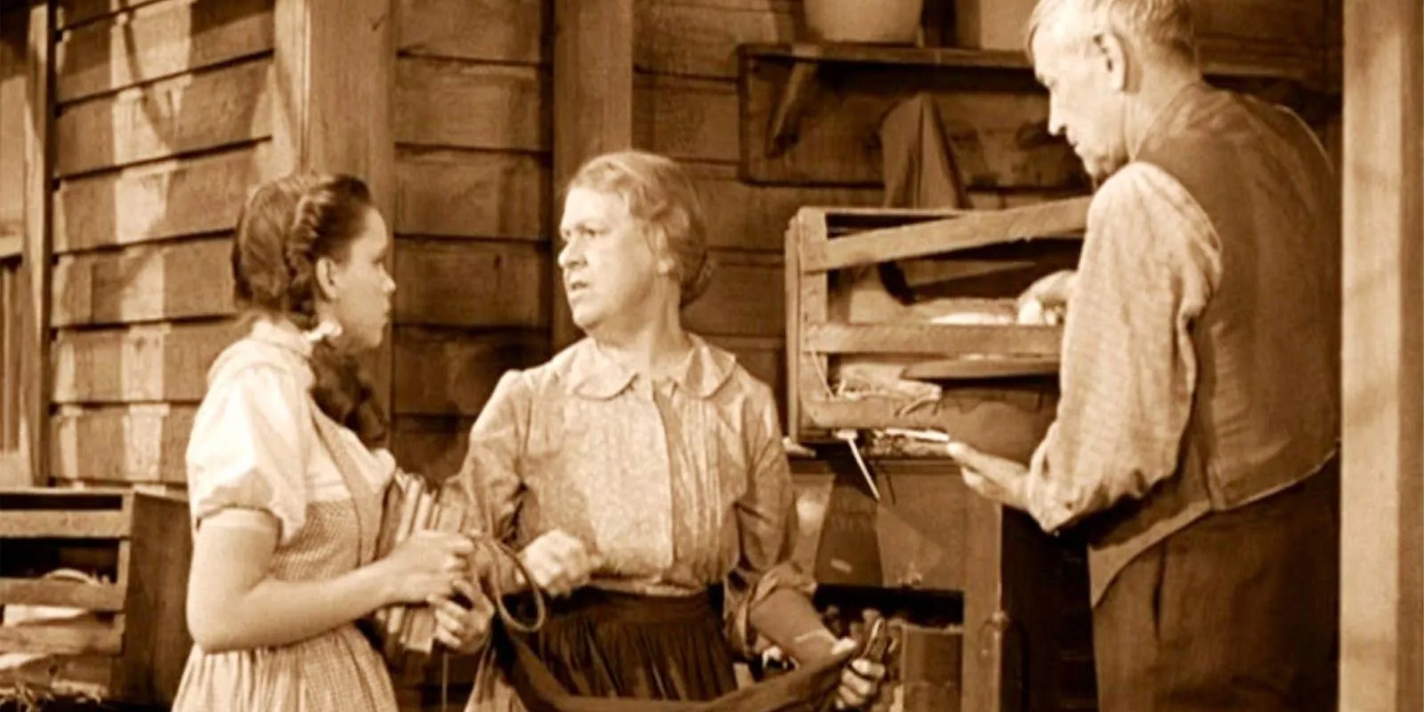 Auntie Em brushes Dorothy aside while taking care of important farm business in The Wizard Of Oz.