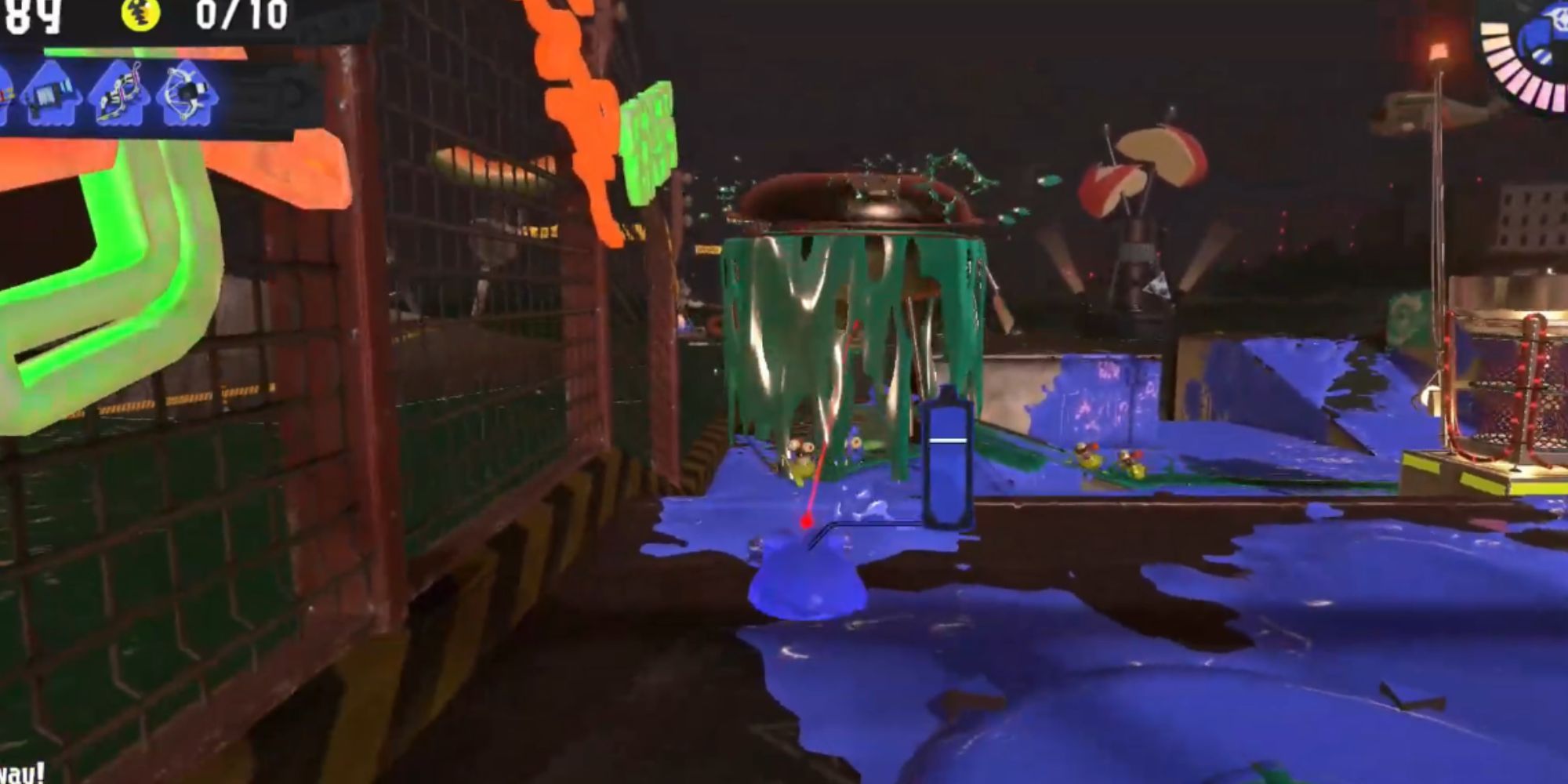 A Griller chases an Inkling hiding under blue ink