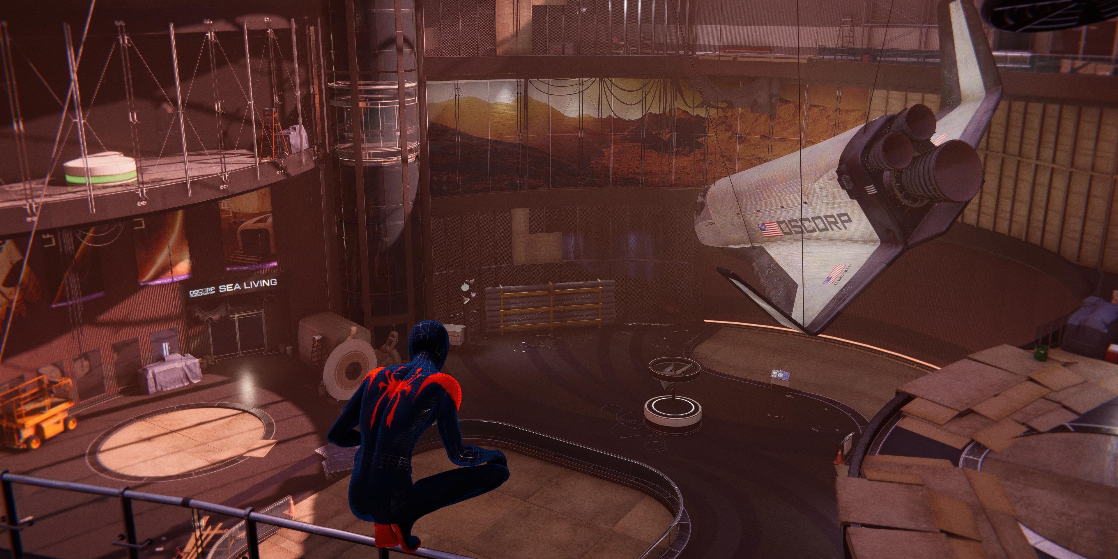 miles morales perched on a railing inside Oscorp Science Museum