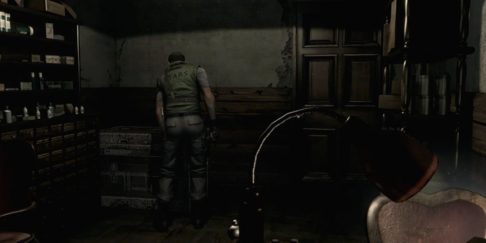 A military agent standing in a small room