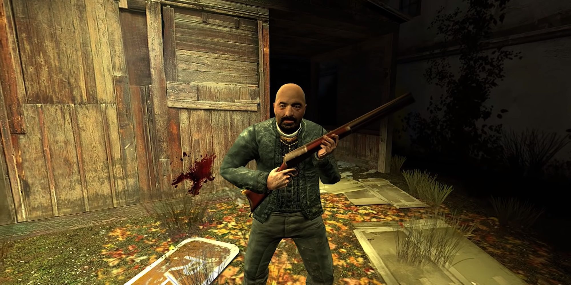 Father Grigori holds his rifle Annabelle to his chest as he stands outside a bloodied wooden shack
