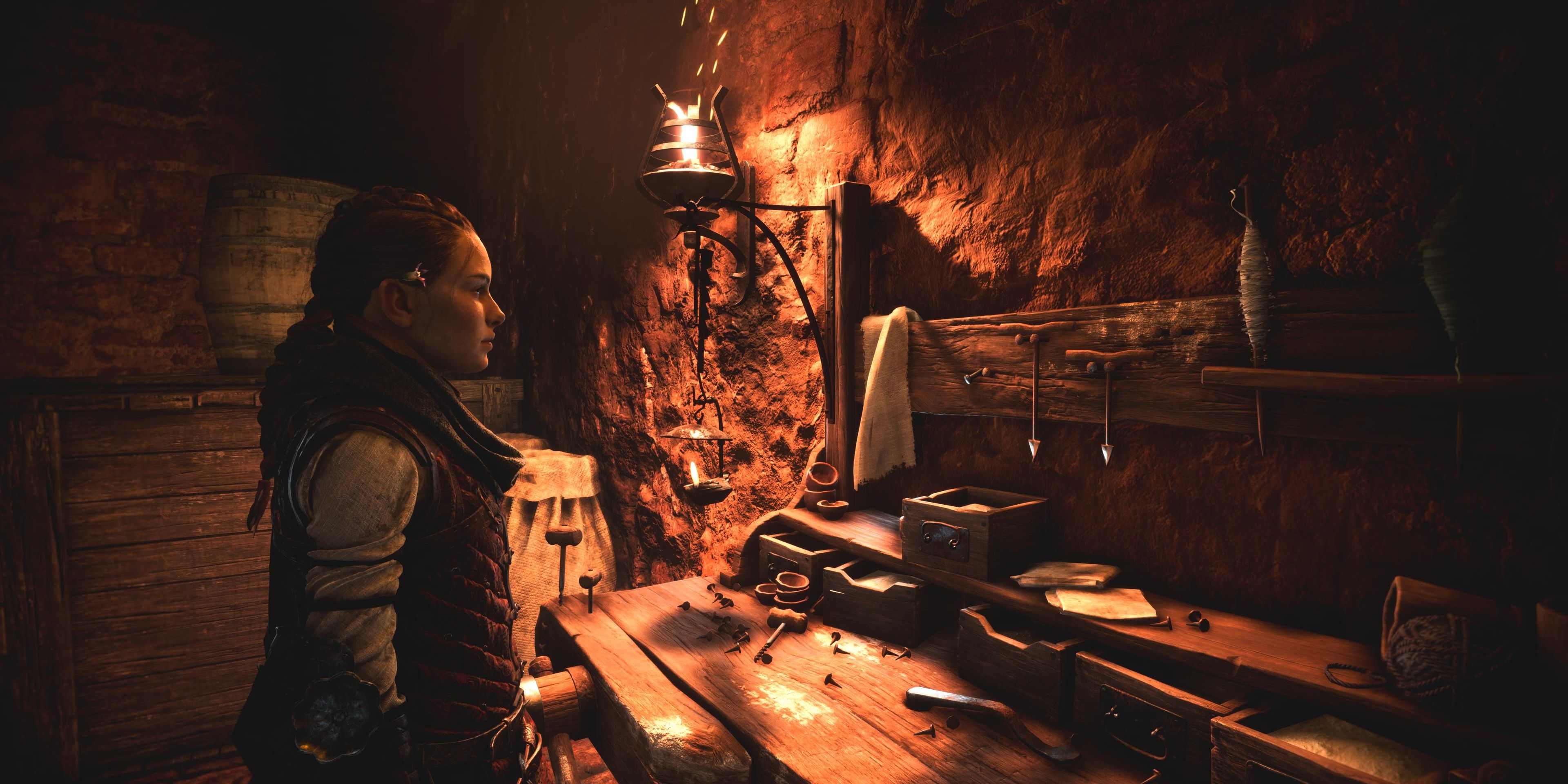 amicia standing at workbench